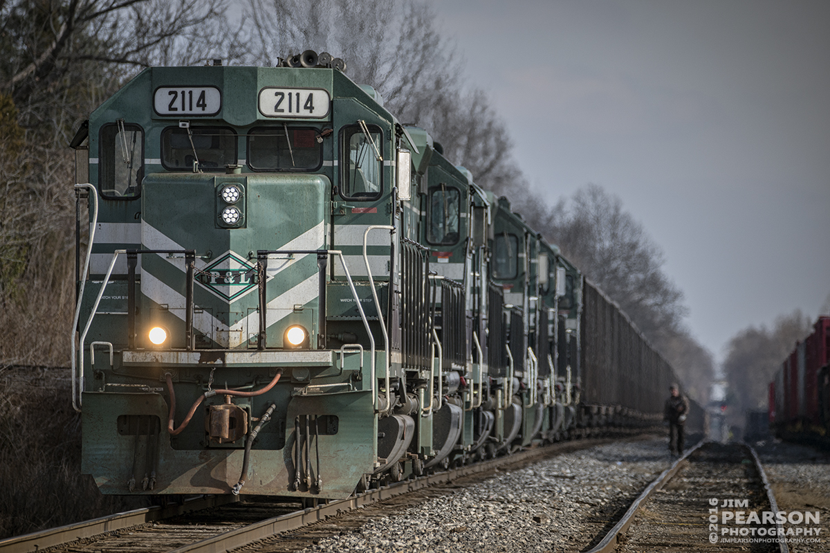 January 27, 2016 - The conductor for Paducah and Louisville Railway's 2114 makes his way back to the head end of their loaded coal train, at West Yard in Madisonville, Ky, as they prepare to head south to Calvert City Loadout. - Tech Info: 1/1250 | f/5.6 | ISO 250 | Lens: Sigma 150-600 @ 350mm with a Nikon D800 shot and processed in RAW.