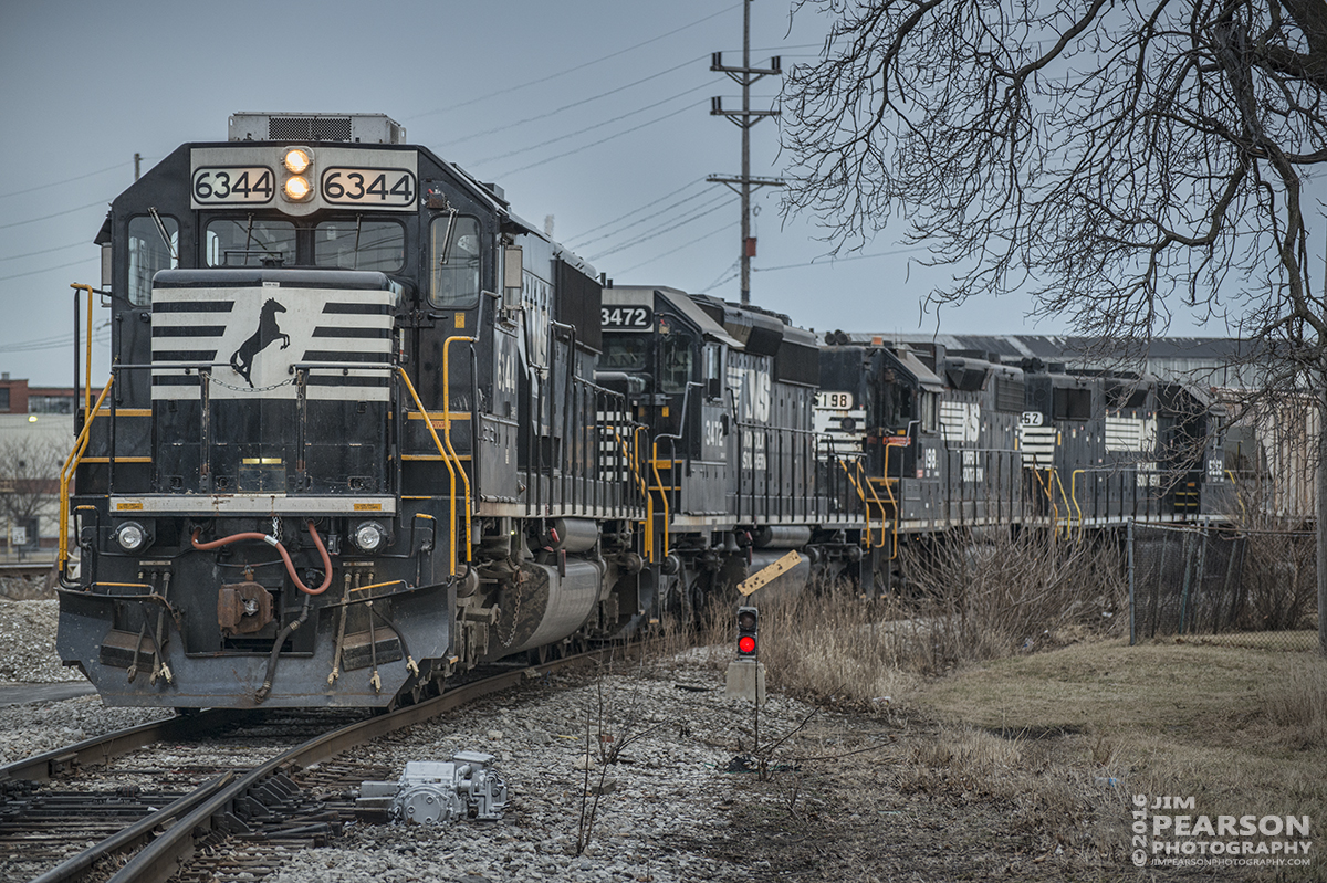 February 7, 2016 - Norfolk Southern L11 backs into NS Blair yard at Fostoria, Ohio off the NS Transfer track at F Tower. The power lashup is 6344, 3472, 5198 and 5252. - Tech Info: 1/200 | f/4 | ISO 720 | Lens:Nikon 70-300 @ 112mm on a Nikon D800 shot and processed in RAW.