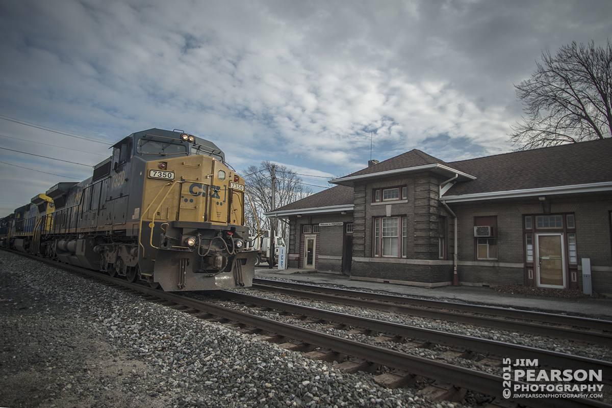 February 7, 2016 - At dusk a eastbound CSX intermodal train, with engine 5259 leading leading, passes the ex B&O passenger station at Fostoria, Ohio, on CSX's Willard Subdivision. - Tech Info: 1/1250 | f/2.8 | ISO 500 | Lens: Nikon 18mm on a Nikon D800 shot and processed in RAW.