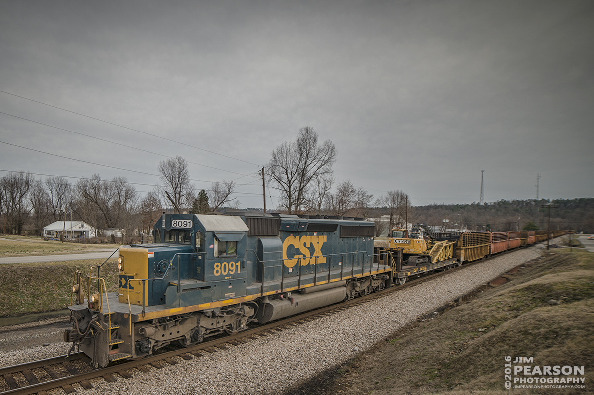 February 22, 2016 - CSX loaded tie train W957-22 makes its way north on the Henderson Subdivision as it passes through Mortons Gap, Ky with CSXT 8091 as power. - Tech Info: 1/2000 | f/2.8 | ISO 110 | Lens: Rokinon 14mm on a Nikon D800 shot and processed in RAW.