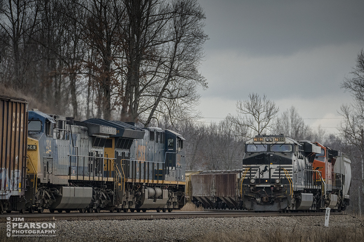 February 25, 2016 - CSX Q647-24, with NS 7683 leading and BNSF 608 trailing, waits in the siding at the south end of Romney in Nortonville, Ky as it meets CSX Q688-25 heading north on the Henderson Subdivision. - Tech Info: 1/1000 | f/5.6 | ISO 2200 | Lens: Sigma 150-600 @ 280mm on a Nikon D800 shot and processed in RAW.