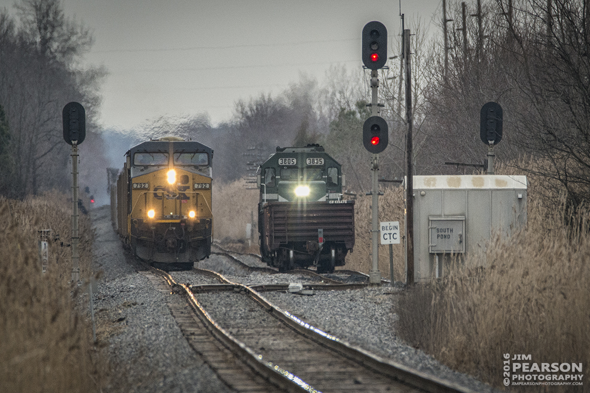 February 25, 2016 - Paducah and Louisville Local WW1 passes a empty CSX coal train with CSXT 792 leading, at the south end of the Pond River Siding, as it makes it's way north at Madisonville, Ky - Tech Info: 1/2000 | f/6.3 | ISO 1400 | Lens: Sigma 150-600 @ 600mm on a Nikon D800 shot and processed in RAW.