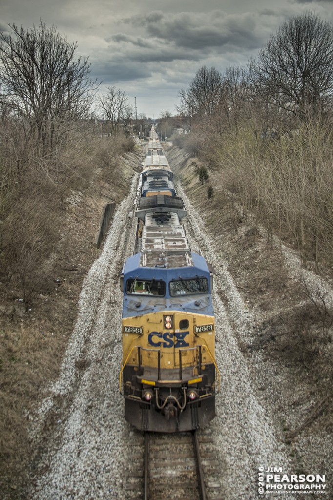 March 8, 2016  CSX empty grain train, V448 heads through Madisonville, Ky as it makes its way north on the Henderson Subdivision.   Tech Info: 1/1000 | f/2.8 | ISO 100 | Lens: Nikon 18mm on a Nikon D800 shot and processed in RAW.