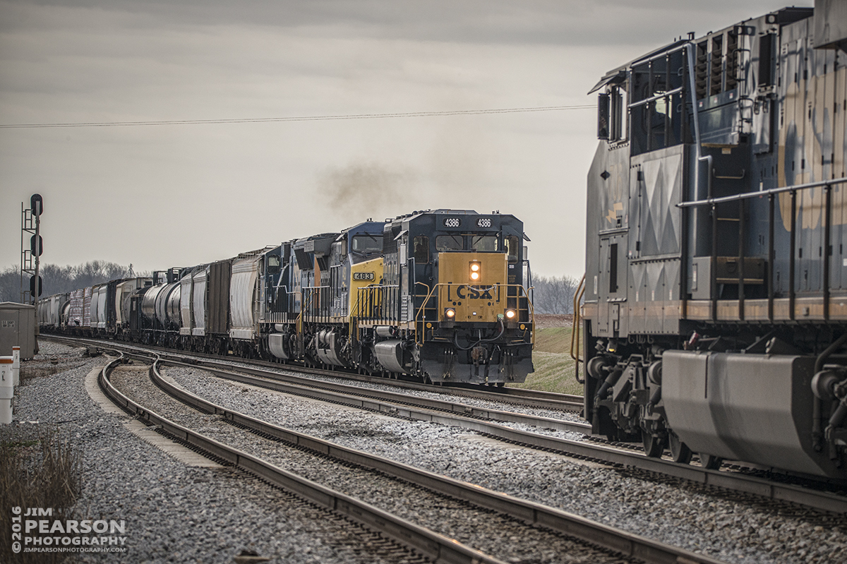 March 9, 2016 - CSX Q586 heads north up the Caskey Yard lead from Pembroke, Ky, as it meets a southbound CSX Q025 at the south end of CSX's Casky Yard at Hopkinsville, Ky, on the Henderson Subdivision. - Tech Info: 1/1000 | f/5 | ISO 250| Lens: Sigma 150-600 @ 150mm on a Nikon D800 shot and processed in RAW.