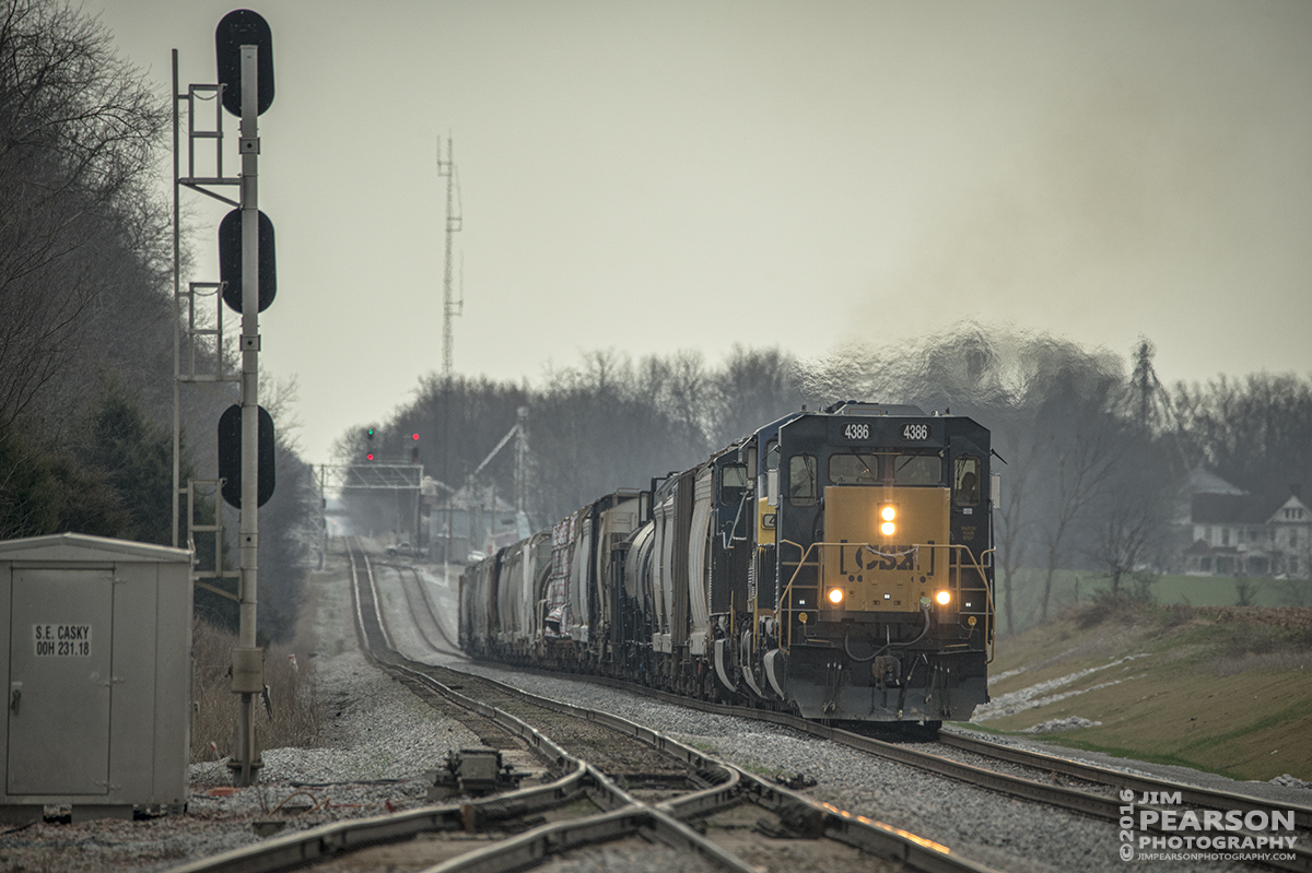 March 9, 2016 - CSX Q586 limps up the Caskey Yard lead from Pembroke, Ky, because of a bad order car, as it makes it's way past the south end of CSX's Casky Yard at Hopkinsville, Ky, to drop it off in the yard, on the Henderson Subdivision. - Tech Info: 1/1000 | f/6.3 | ISO 450| Lens: Sigma 150-600 @ 550mm on a Nikon D800 shot and processed in RAW.