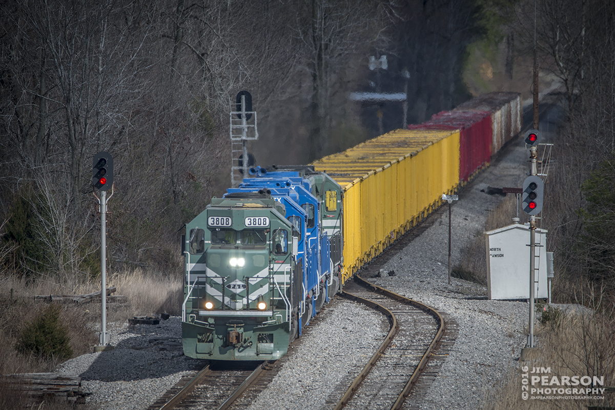 March 14, 2016 - A Paducah and Louisville Railway empty ballast train heads south, past the signals at the north end of the siding at Dawson Springs, Ky, on it's way to Grand Rivers to pickup a load of rock, with units PAL 3808, GATX/GMTX 2207, 2698 and PAL 2125. - Tech Info: 1/1250 | f/6.3 | ISO 200 | Lens: Sigma 150-600 @ 600mm on a Nikon D800 shot and processed in RAW.