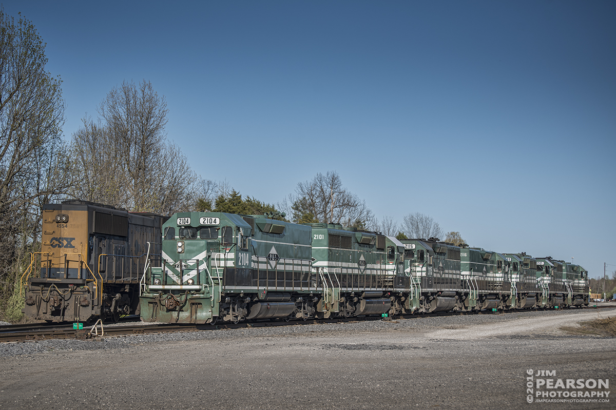 April 3, 2016 - Paducah and Louisville Railway 2104 pulls out of the siding at West Yard with 7 units as it works on building a local which had another 2 CSX units and about six cars. Pretty much a power move I'd say! The train headed south toward Paducah. - Tech Info: 1/500 | f/4.5 | ISO 110 | Lens: Nikon 70-300 @ 80mm on a Nikon D800 shot and processed in RAW.