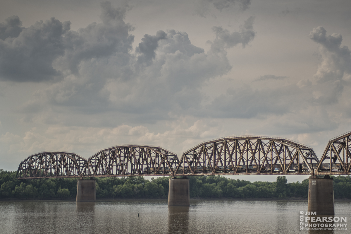 June 1, 2016  CSX local J724 heads north across the Ohio River on the Henderson Subdivision at Henderson, Ky after combining its train with Q586 when its crew ran out of time. - Tech Info: 1/3200 | f/2.8 | ISO 180 | Lens: Sigma 24-70 @ 62mm with a Nikon D800 shot and processed in RAW.