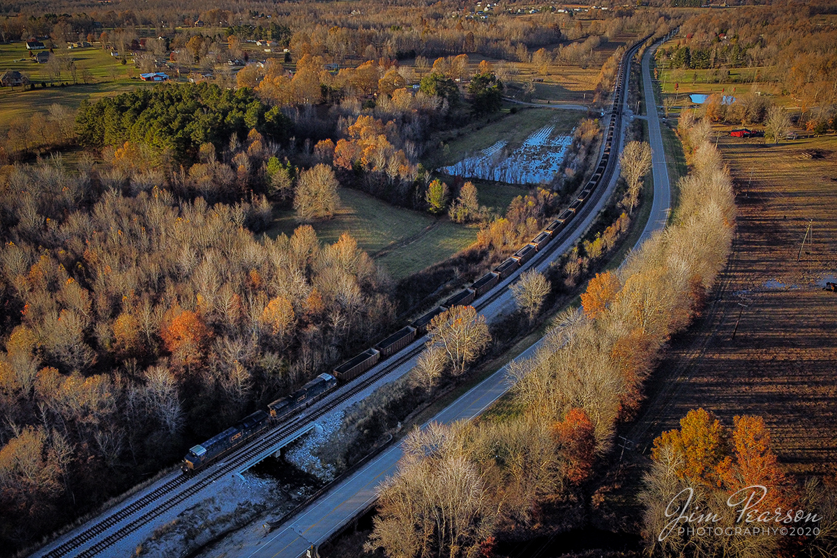 N015 Evansville, IN (EVWR) - Palatka, FL

CSX loaded coal train N015 weaves its way through the countryside as the late evening like rakes across the tops of trees as it heads south through Nortonville, Kentucky on November 12th, 2020 on the Henderson Subdivision.

Tech Info: DJI Mavic Mini Drone, JPG, 4.5mm (24mm equivalent lens) f/2.8, 1/200, ISO 100.