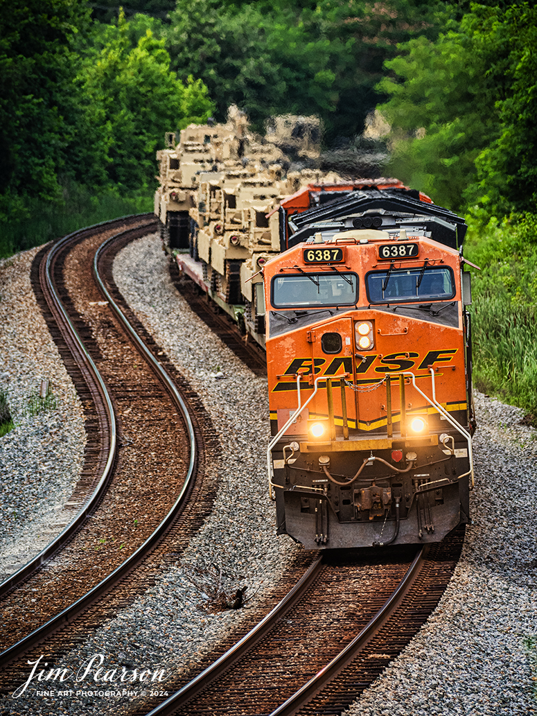 BNSF 6387 and 3947 lead CSX S577 heads south as it passes through the S Curve at Nortonville, Kentucky with a loaded military train bound for Ft. Campbell on the CSX Henderson Subdivision on July 9th, 2024

Tech Info: Nikon D810, Sigma 150-600mm @280mm, RAW, 22mm, f/5.6, 1/800, ISO 400.

#railroad #railroads #train #trains #bestphoto #railroadengines #picturesoftrains #picturesofrailway #bestphotograph #photographyoftrains #trainphotography #JimPearsonPhotography #trendingphoto #militarytrains #bnsf