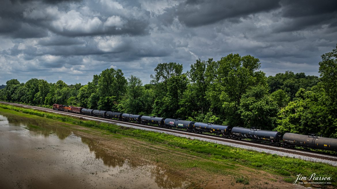 Canadian Pacific 8925 and BNSF 6749 lead CSX B647, a loaded ethanol train, headed southbound at Slaughters, Kentucky on May 25th, 2024, on the CSX Henderson Subdivision.

Tech Info: DJI Mavic 3 Classic Drone, RAW, 22mm, f/8, 1/2000, ISO 100.

#trainphotography #railroadphotography #trains #railways #jimpearsonphotography #trainphotographer #railroadphotographer #dronephoto #trainsfromadrone #CSX