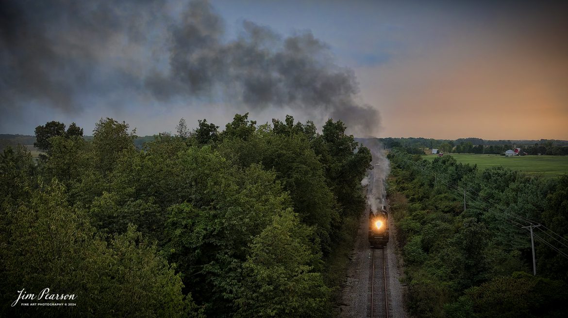 August 30th, 2024, Steam locomotive Nickel Plate 765 pulls “The Limited” through the countryside during the golden light of sunset as they make their way to Reading, Michigan as part of Indiana Rail Experience’s Rolling Victory Weekend.

According to their website: Rolling Victory was a three-day living history event celebrating American military, railroad, and home front history featuring vintage train rides, World War II reenactors, battles, a big band orchestra, and an immersive and educational experience for all ages in Pleasant Lake, Indiana.

Tech Info: DJI Mavic 3 Classic Drone, RAW, 24mm, f/2.8, 1/500, ISO 800.

#railroad #railroads #train, #trains #railway #railway #steamtrains #railtransport #railroadengines #picturesoftrains #picturesofrailways #besttrainphotograph #bestphoto #photographyoftrains #bestsoldpicture #JimPearsonPhotography #steamtrains #nkp765 #passengertrains #trainsfromtheair #trainsfromadrone