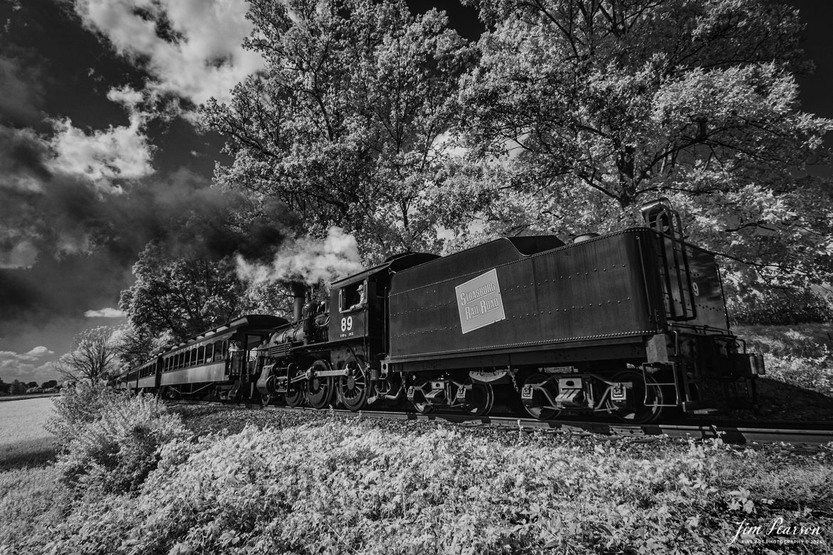 In this week’s Saturday Infrared photo, we catch a loaded Strasburg steam locomotive 89 as it pulls a passenger train out of Strasburg, PA on October 7th, 2024. Strasburg has a pull-push operation, where on the outbound trip the engine pulls the train in reverse and on the return move it leads the train, after running around it in a siding at Paradise, PA.

According to Wikipedia: The Strasburg Rail Road (reporting mark SRC) is a heritage railroad and the oldest continuously operating standard-gauge railroad in the western hemisphere, as well as the oldest public utility in the Commonwealth of Pennsylvania. Chartered in 1832, the Strasburg Rail Road Company is today a heritage railroad offering excursion trains hauled by steam locomotives on 4.02 mi of track in Pennsylvania Dutch Country, as well as providing contract railroad mechanical services, and freight service to area shippers. The railroad's headquarters are outside Strasburg, Pennsylvania.

Tech Info: Fuji XT-1, RAW, Converted to 720nm B&W IR, Nikon 10-24 @12mm, f/4.5, 1/500, ISO 200.

#trainphotography #railroadphotography #trains #railways #jimpearsonphotography #infraredtrainphotography #infraredphotography #trainphotographer #railroadphotographer #infaredtrainphotography #trending