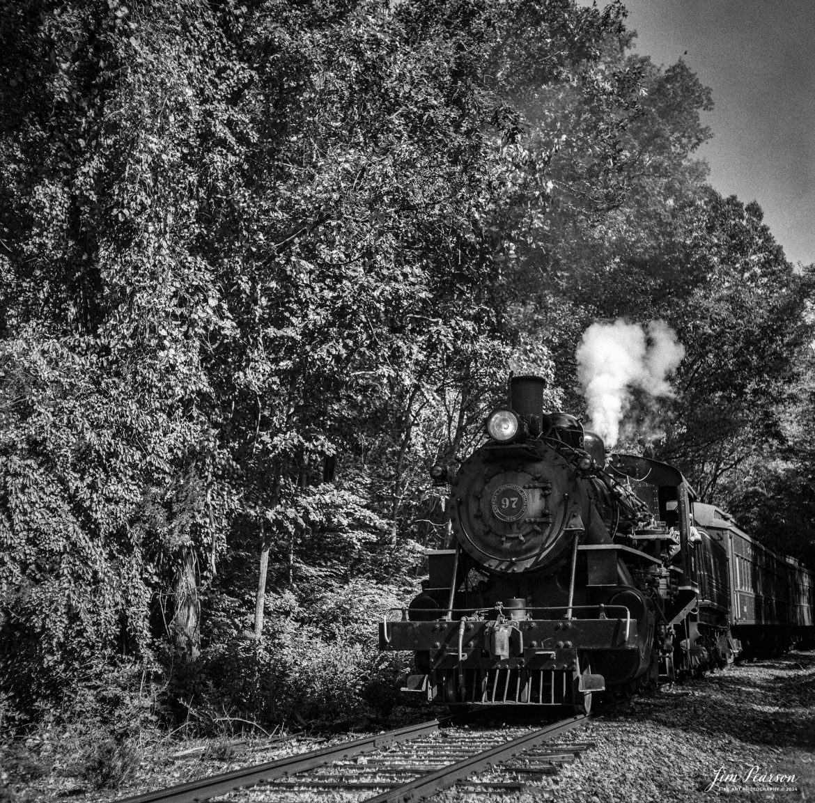 Film Wednesday – October 9th, 2024, The Valley Railroad Company steam engine #97 heads out of Essex, Connecticut with three passenger coaches, during a Dak Dillon Photography photo charter.

According to Wikipedia: The Valley Railroad, operating under the name Essex Steam Train and Riverboat, is a heritage railroad based in Connecticut on tracks of the Connecticut Valley Railroad, which was founded in 1868. The company began operations in 1971 between Deep River and Essex and has since reopened additional parts of the former Connecticut Valley Railroad line. It operates the Essex Steam Train and the Essex Clipper Dinner Train.

Valley Railroad No. 97 is a preserved 2-8-0 steam locomotive that was built in 1923 by the American Locomotive Company's Cooke Works.

Tech Info: Mamiya C330 Professional, Ilford HP5 Film, Mamiya 80mm, f/5.6, 1/500, ISO 400.

#JimPearsonPhotography #filmphotography #blackandwhite #filmphotography