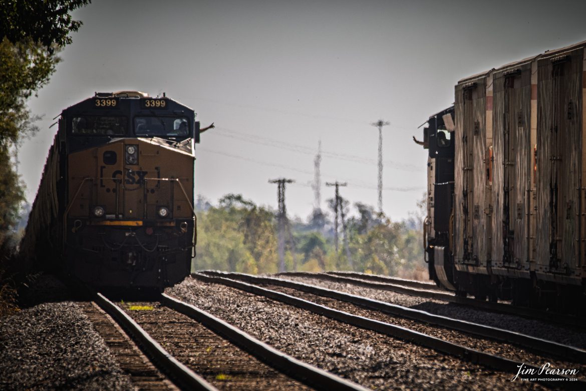 The conductors on G366 and M513 wave to each other as they meet at CSX Casky Yard on the CSX Henderson Subdivision at Hopkinsville, Ky, on October 22nd, 2024.

Tech Info: Nikon D800, RAW, Sigma 150-600 @550mm, f/6.3, 1/1000, ISO 160.

#trainphotography #railroadphotography #trains #railways #trainphotographer #railroadphotographer #jimpearsonphotography #onecsx #csxt