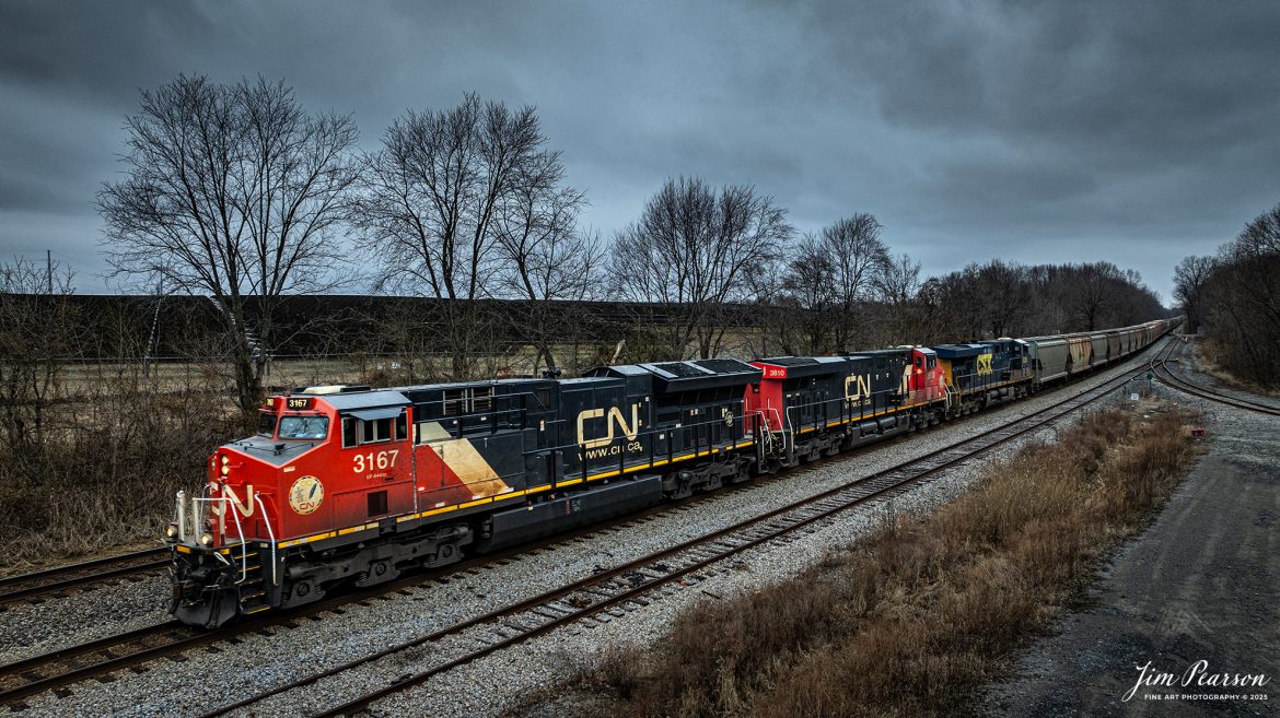 CSX B241, led by Canadian National 31678, heads south between Robards and Sebree, Ky, on February 6th, 2025, on the CSX Henderson Subdivision.

Tech Info: DJI Mavic 3 Classic Drone, RAW, 24mm, f/2.8, 1/640, ISO 150

#railroad #railroads #train, #trains #railway #railway #railtransport #railroadengines #picturesoftrains #picturesofrailways #besttrainphotograph #bestphoto #photographyoftrains #bestsoldpicture #JimPearsonPhotography #trainsfromadrone