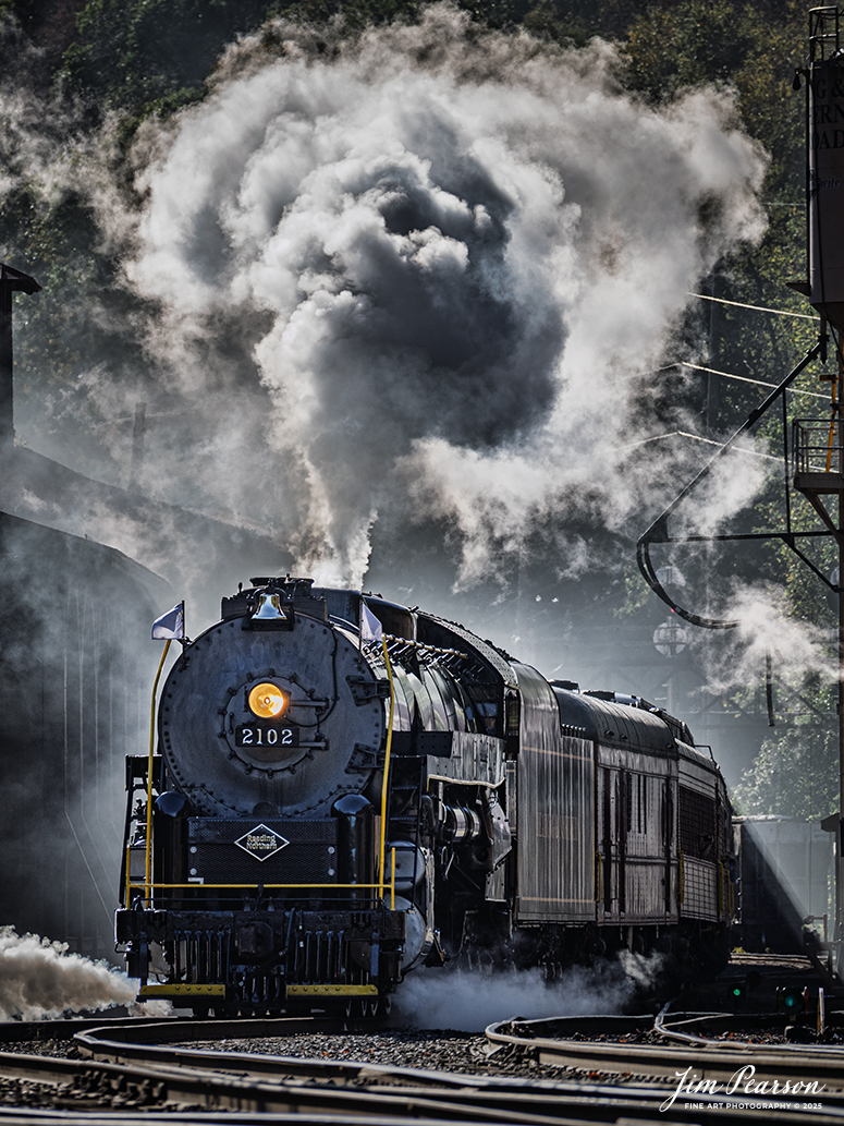 Reading Blue Mountain & Northern Railroad steam locomotive 2102 departs the station at Port Clinton, Pennsylvania on October 5th, 2024,during its first day of the year of pulling Fall Foliage Excursions.

According to their website: The Reading Company T-1 class #2102 was built in the Reading’s own locomotive shops in 1945. With drivers of 70” diameter, it weighs 404 tons, and its tender holds up to 26 tons of coal, and up to 19,000 gallons of water. After the Reading Steam era was over, the Reading Company used 2102 for the Reading Rambles on several different excursions. The 2102 has had many different owners since it was retired by the Reading Railroad. It is one of only four to survive. The other remaining locomotives are the 2100, 2101, and 2124.

The Blue Mountain and Reading Railroad purchased the 2102 in 1987, and it ran on the Temple to South Hamburg line into the early 1990’s. Once the Blue Mountain and Reading Railroad became the Reading Blue Mountain & Northern, the 2102 ran over Reading & Northern’s rails for a short time before it was removed from service in the early 1990’s. 

In 2022, steam locomotive 2102 reentered service on the Reading & Northern. The locomotive has been used actively to pull both passenger excursions and revenue freight trains.

Tech Info: Nikon D810, RAW, Nikon 70-300 @ 300mm, f/5.6, 1/640, ISO 200.

#steamtrains #besttrainphotograph #JimPearsonPhotography #RBNRR