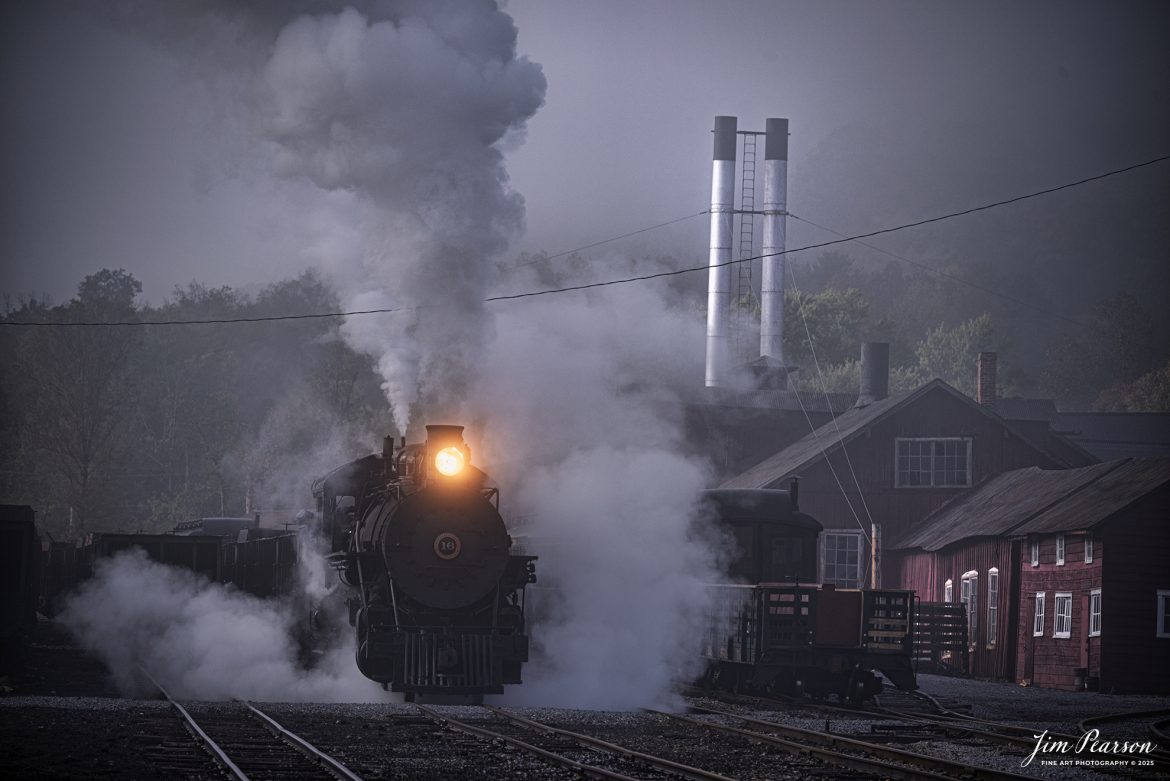 East Broad Top (EBT) steam locomotive #16 pulls a mixed freight through the early morning fog as they head out of the yard at Rockhill Furnace, Pennsylvania on October 6th, 2024, during the museum’s Friends of the East Broad top event.

According to the East Broad Top Website: Locomotive #16 was built in 1916 by the Baldwin Locomotive Works.

Entering the age of modern steam in 1916, the EBT received its first of three large Mikados. Unlike the previous three smaller locomotives, #16 came with superheaters, piston valves, and Southern valve gear. One story mentions #16 pulled 60 empty hoppers from Mt. Union to Rockhill in one train, literally clearing out the yard. #16 underwent an overhaul in 1955 and made only a handful of trips in early 1956 before the railroad shut down. On February 1, 2023, the locomotive returned to service.

Tech Info: Nikon D810, RAW, Nikon 70-300 @170mm, f/5.3, 1/640, ISO 125.

steam locomotive, train, railways, vintage, smoke, green hillside, sunlight, iron bridge, transportation, travel, photography of trains, train photography, Jim Pearson Photography, trending photo, East Broad Top Railroad, steam train