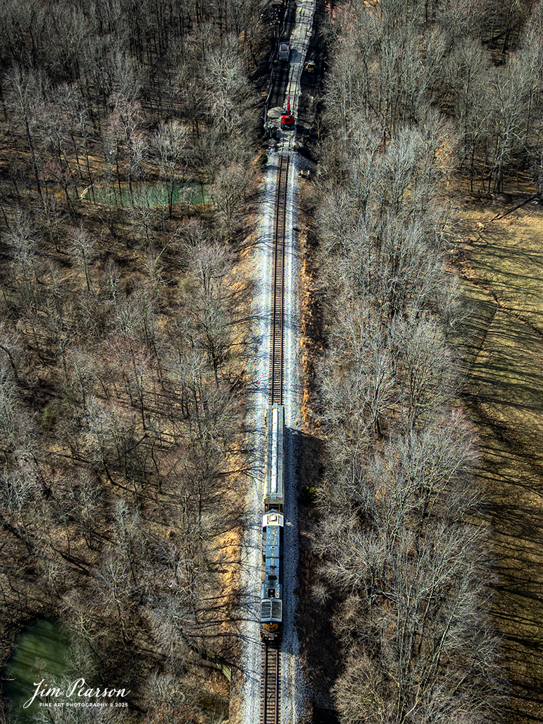 CSX L385 picks up the last standing car from the M501 derailment site on the cutoff track for the CSX Henderson Subdivision, just outside of Mortons Gap, Ky, on March 3rd, 2025. The derailment happened in the early morning hours on March 2nd, 2025, as the train was approaching Mortons Junction. After crews working on removing the cars and repairing the tracks, CSX was close to reopening the cutoff to traffic and I’m fairly sure by the time this picture posts it’ll be back open. I’m told that a broken drawbar was likely what caused the derailment, but that’s not official. No one was injured in this event.

Tech Info: DJI Mavic 3 Classic Drone, RAW, 22mm, f/2.8, 1/800, ISO 100.

#railroad #railroads #train, #trains #railway #railway #railtransport #railroadengines #picturesoftrains #picturesofrailways #besttrainphotograph #bestphoto #photographyoftrains #bestsoldpicture #JimPearsonPhotography #trainsfromadrone #trainderailment #csxhendersonsubdivision #onecsx