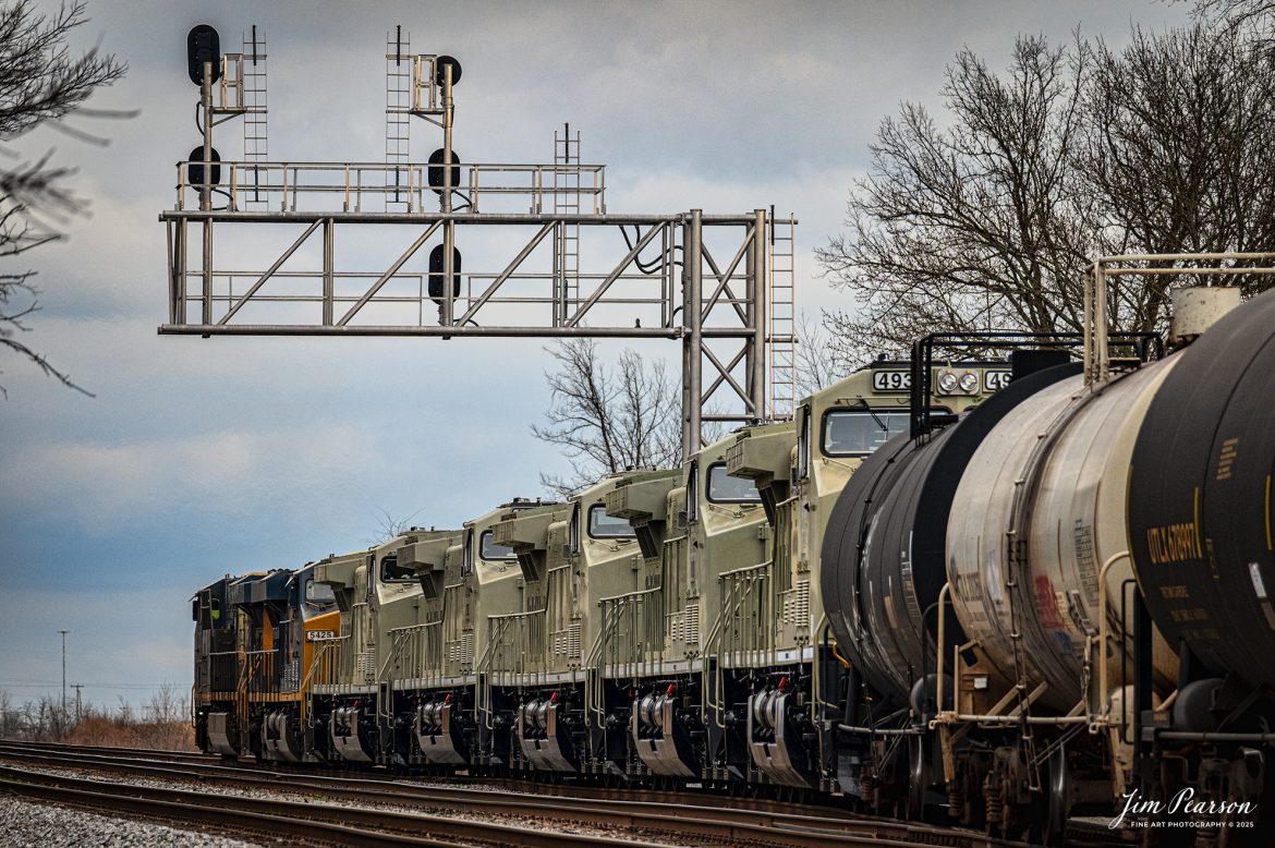 CSX M813 heads south into the north end of Casky Yard at Hopkinsville, Kentucky, with engines FEX 4937, 4936, 4934, 4939, 4938 in tow on the CSX Henderson Subdivision on March 16th, 2025. The locomotives in tow are bound for the Ferromex Railroad.

Ferromex (reporting mark FXE) (syllabic abbreviation of Ferrocarril Mexicano, 'Mexican Railway') is a private rail consortium that operates the largest (by mileage) railway in Mexico with combined mileage (Ferromex + Ferrosur) of 12,100 kilometres (7,500 mi) and is often classed with North American Class I railroads.

Ferromex began operating on February 19, 1998, following the privatization of most of the government-owned railways by Mexican President Ernesto Zedillo Ponce de León. Ferromex operates more than 9,610 kilometers (5,970 mi) of track and interconnects five major inland Mexican cities, five cities along the border with the United States, four seaports on the Pacific Ocean, and one more on the Gulf of Mexico. Grupo México owns 74% and Union Pacific Corporation owns 26% of the company. The Ferromex system operates 9,610 km of Ferromex tracks plus 2,654 kilometers (1,649 mi) of Ferrosur tracks.

Tech Info: Nikon Z6ii Mirrorless Camera, RAW, Nikon 70-300 @240mm, f/5.6, 1/1000, ISO 900.

#railroad #railroads #train, #trains #railway #railway #railtransport #railroadengines #picturesoftrains #picturesofrailways #besttrainphotograph #bestphoto #photographyoftrains #bestsoldpicture #JimPearsonPhotography #trainsfromadrone #csxhendersonsubdivision #onecsx #Ferromex