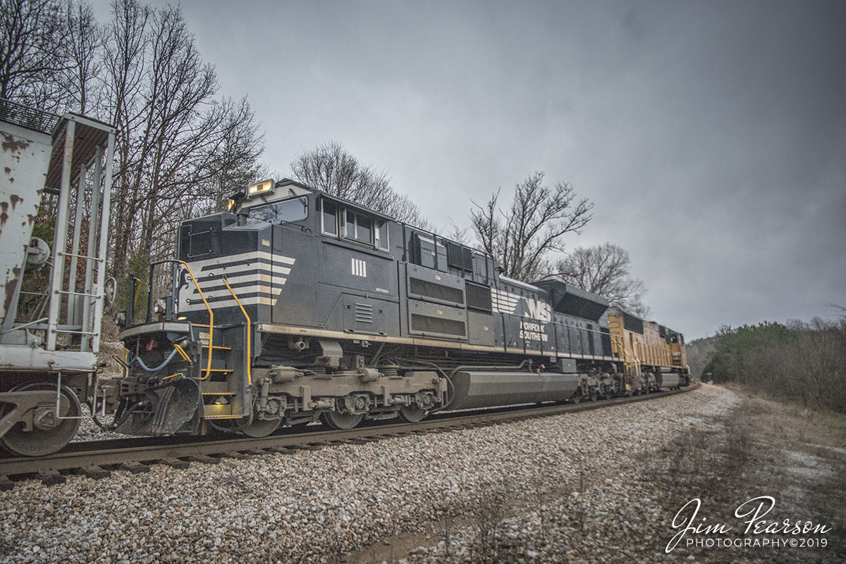 February 21, 2019 - Norfolk Southern 1111, referred to as the "Bar Code" unit, trails behind Union Pacific 4254, leading CSX Q501, as it heads south on the Henderson Subdivision at Sand Cut, just north of Crofton, Kentucky under stormy skies. - #jimstrainphotos #kentuckyrailroads #trains #nikond800 #railroad #railroads #train #railways #railway #csx #csxrailroad