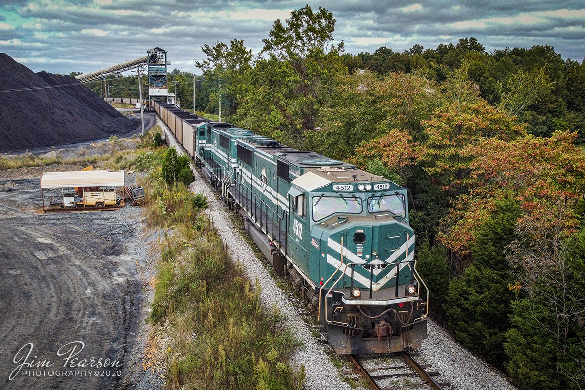 September 26, 2020 - Paducah and Louisville 4512 leads empty coal train PRX1 as it prepares to load its train at the Warrior Mine Coal loop in Nebo, Kentucky, with a tinge of fall foliage beginning to show in the trees.

Tech Info: DJI Mavic Mini Drone, JPG, 4.5mm (24mm equivalent lens) f/2.8, 1/400, ISO 200.