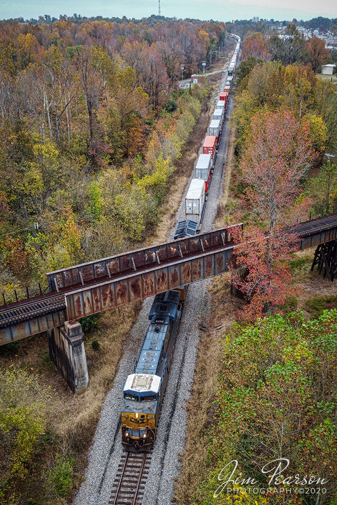 Bedford Park, IL - Jacksonville, FL

CSX hot intermodal Q025-28 passes under the Paducah and Louisville Railway at Arklow on October 28th, 2020 as it heads south on the Henderson Subdivision.

Tech Info: DJI Mavic Mini Drone, JPG, 4.5mm (24mm equivalent lens) f/2.8, 1/160, ISO 100.