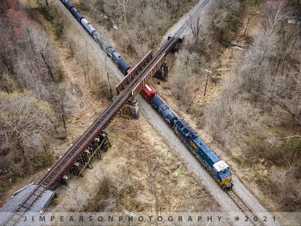 X marks the spot on the Henderson Subdivision

I keep returning to this spot called Monarch, where the CSX Henderson Subdivision crosses under the Paducah and Louisville Railway (PAL), attempting to catch a shot with traffic on both lines, here in Madisonville, Kentucky on the Henderson Subdivision.

There was a PAL train in the neighborhood when I put the drone over Monarch on March 16th, 2021, catching this shot of CSX Q500 as it headed north, however the PAL local didnt pass until much later. Ive found over the years that persistence pays off in the long run, so I continue to revisit this spot, waiting for the right moves to appear!

Tech Info: DJI Mavic Air 2 Drone, RAW, 4.5mm (24mm equivalent lens) f/2.8, 1/240, ISO 200.