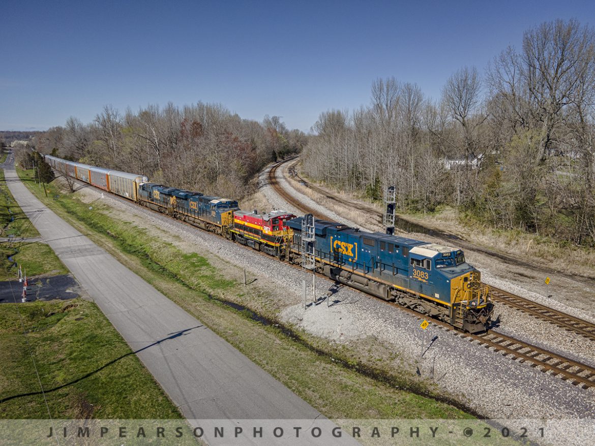 CSX Q513-26 with two interesting moves

Its not very often that I catch a train that has two interesting moves at the same time, but March 26th, 2021 was one of those days when I caught CSX Q513 heading south on the Henderson Subdivision!

Up front behind the first engine was a GMTX 192 switcher (ex-Kansas City Southern Unit) passing through Mortons Junction at Mortons Gap, Ky, which Im told is headed for St. Marys Railroad Company, located in St. Marys, Georgia.

On the rear of the train was Mid-America Railcar Leasing (MRLX) 1226, which appears to be an ex-Amtrak baggage car that I'm also told is headed for the Georgia coastal railway at St. Marys, Georgia. Im also told that it will be converted to a gift shop for their excursion trains. Here its passing through the crossing at the north end of the siding at Kelly, Ky, behind the DPU on the rear of the train as they head south on the Henderson Subdivision.

St. Marys Railroad (reporting marks SM) is a standard gauge, Class III, common carrier railroad based out of St. Marys, Georgia. Interchange is made with the First Coast Railroad in Kingsland, Georgia and gives customers easy access to Jacksonville, Florida railroads CSX Transportation, Norfolk Southern Railway and Florida East Coast Railway.

Mid America Railcar Leasing is a limited liability company that leases private passenger railroad cars, most of which can be pulled on the end of Amtrak trains.

Tech Info: DJI Mavic Air 2 Drone, RAW, 4.5mm (24mm equivalent lens) f/2.8, 1/800 & 1/1250, ISO 100.