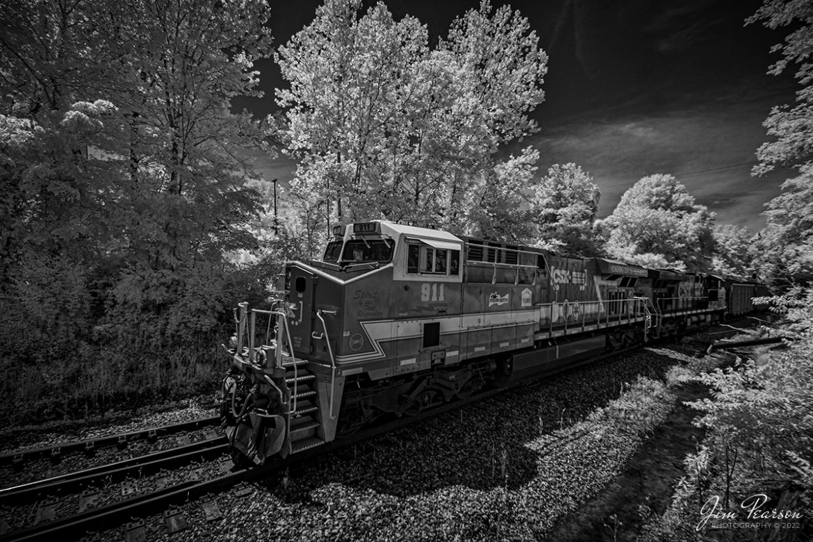 This afternoon we have an infrared shot of CSXT 911 as it leads B419, a loaded coke train on May 15th, 2022, as it prepares to enter the north end of CSX Atkinson Yard at the location known as Arklow at Madisonville, Kentucky on the Henderson Subdivision.

CSXT 911 is one of several specialty painted units that CSX has painted in the last few years and this unit honors First Responders.

Tech Info: Fuji XT-1, RAW, Converted to 720nm B&W IR, Nikon 10-24 @ 10mm, f/4, 1/950, ISO 200, Exp. Comp.: -1.0.

#trainphotography #railroadphotography #trains #railways #jimpearsonphotography #infraredtrainphotography #infraredphotography #trainphotographer #railroadphotographer