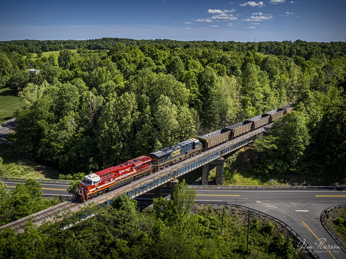 CSXT 911 leads a northbound empty coke train on May 15th, 2022, as it passes over highway 61 at Suwanee, Kentucky on the Paducah and Louisville Railway after dropping its load at Calvert City Terminal in Calvert City, KY. 

CSXT 911 is one of several specialty painted units that CSX has painted in the last few years and this unit honors First Responders.

Tech Info: DJI Mavic Air 2S Drone, Altitude 123ft, RAW, 22mm, f/2.8, 1/1250, ISO 100.

#trainphotography #railroadphotography #trains #railways #dronephotography #trainphotographer #railroadphotographer #jimpearsonphotography