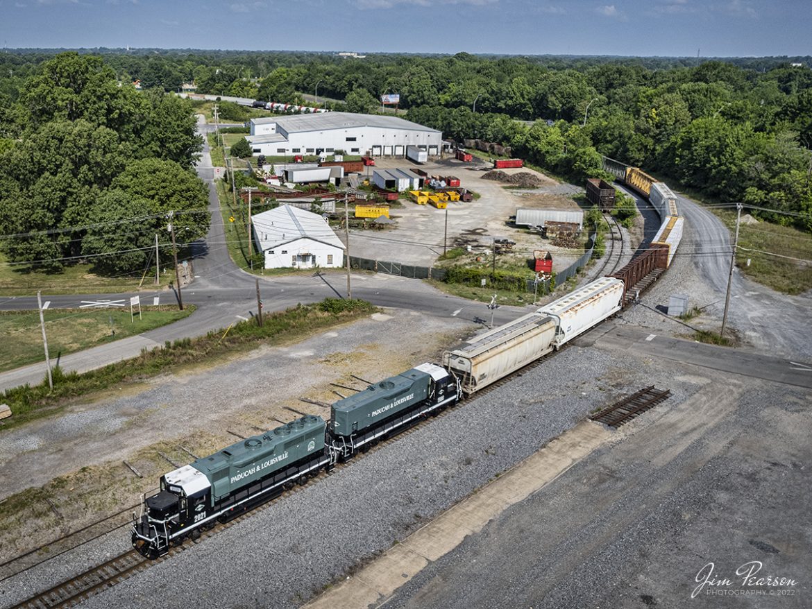 Paducah and Louisville Railways (PAL) newly painted 35th Anniversary engines 2021 and 1986, work out of the north end of the yard on July 8th, 2022, at Paducah, Kentucky as they build a train. 

The two engines have been painted in colors and scheme closely matching the original PAL paint scheme from 1986 and are in celebration of the 35th anniversary of the Paducah and Louisville Railway. Currently these two engines are only seeing yard service at Paducah while they are put through their paces before taking to the road.

Tech Info: DJI Mavic Air 2S Drone, RAW, 22mm, f/2.8, 1/2000, ISO 100.

#trainphotography #railroadphotography #trains #railways #dronephotography #trainphotographer #railroadphotographer #jimpearsonphotography