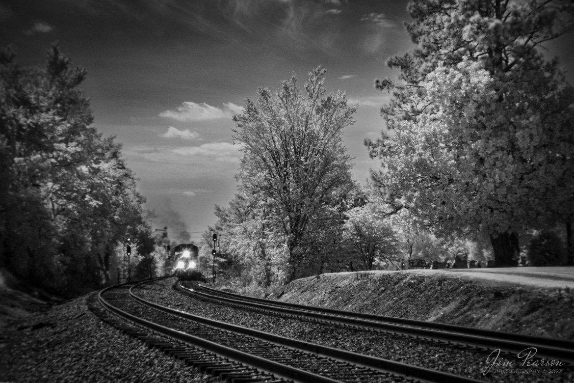 In this Infrared view we find CSX empty coal train E319 heading north as it passes the signals at the south end of the siding at Latham on October 7th, 2022, at Hopkinsville, Kentucky on the Henderson Subdivision.

Tech Info: Fuji XT-1, RAW, Converted to 720nm B&W IR, Holga 60mm pinhole lens,  1/180, ISO 1000.

#trainphotography #railroadphotography #trains #railways #jimpearsonphotography #infraredtrainphotography #infraredphotography #trainphotographer #railroadphotographer