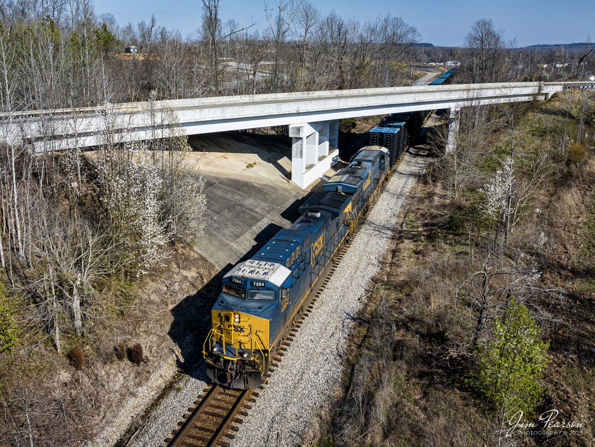 CSXT 7254 leads M512 as it passes under the US 41 overpass at Barnsley, Kentucky on the way north along the Henderson Subdivision on March 7th, 2023. The cargo just behind the power is truck frames bound for Toyota in Indiana. This train runs between Radnor Yard in Nashville, TN and Avon, IN, along with its counterpart, M513.

Tech Info: DJI Mavic 3 Classic Drone, RAW, 24mm, f/2.8, 1/1600, ISO 120.

#trainphotography #railroadphotography #trains #railways #dronephotography #trainphotographer #railroadphotographer #jimpearsonphotography #kentuckytrains #csx #csxrailway #csxhendersonsubdivision #barnsely #mavic3classic #drones #trainsfromtheair #trainsfromadrone