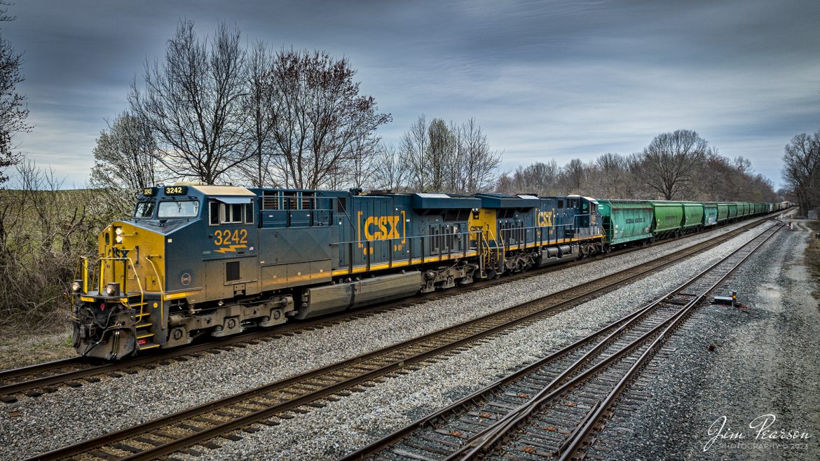 CSXT 3242 leads CSX M513 on its journey south after passing Anaconda at Robards, Kentucky on the Henderson Subdivision on March 9th, 2023 and the unique dwarf signals on the spur that leads out into an industrial area at Sebree, Kentucky.

Tech Info: DJI Mavic 3 Classic Drone, RAW, 24mm, f/2.8, 1/1000, ISO 180.

#trainphotography #railroadphotography #trains #railways #dronephotography #trainphotographer #railroadphotographer #jimpearsonphotography #kentuckytrains #csx #csxrailway #csxhendersonsubdivision #barnsely #mavic3classic #drones #trainsfromtheair #trainsfromadrone