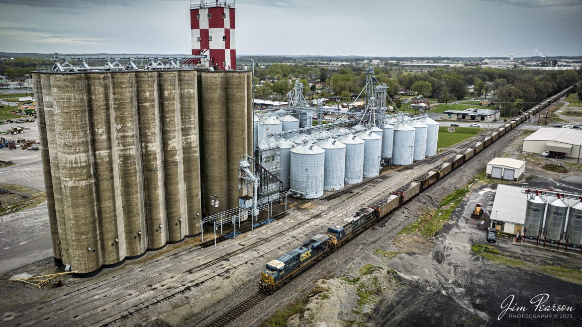 Empty coal train CSX E302 passes the Hopkinsville Elevator Company on Skyline Drive as they make their way north on April 5th, 2023, on the CSX Henderson Subdivision at Hopkinsville, Ky.

Tech Info: DJI Mavic 3 Classic Drone, RAW, 24mm, f/2.8, 320, ISO 110.

#trainphotography #railroadphotography #trains #railways #dronephotography #trainphotographer #railroadphotographer #jimpearsonphotography #kentuckytrains #csx #csxrailway #HopkinsvilleKy #mavic3classic #drones #trainsfromtheair #trainsfromadrone #coaltrain #hopkinsvilleky