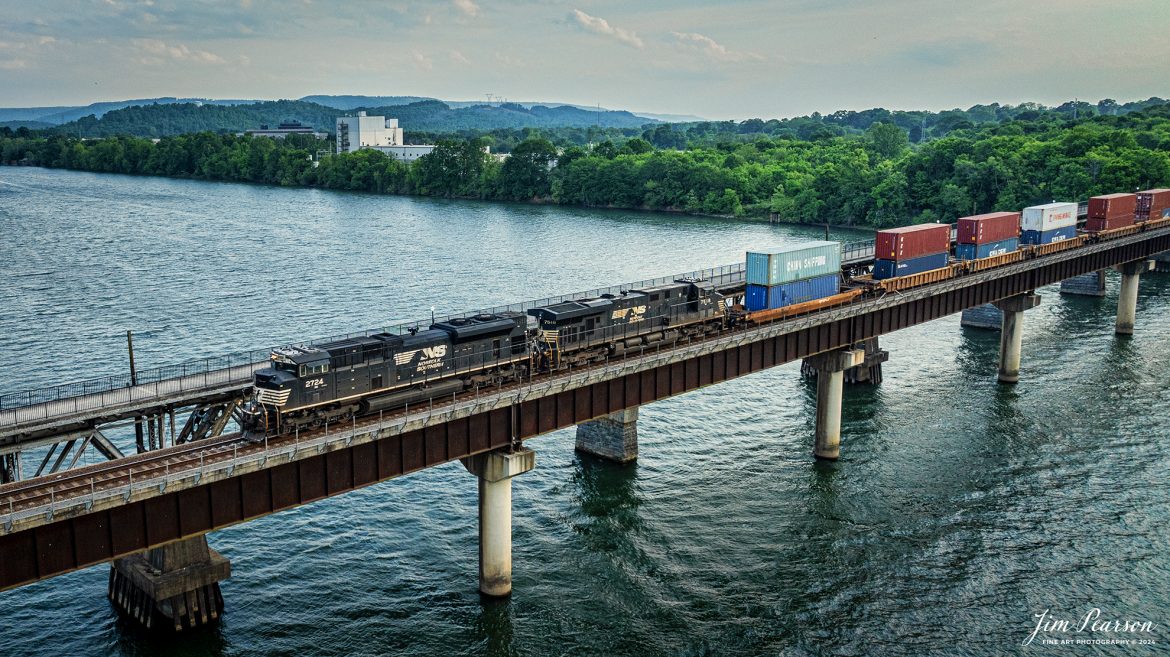 Norfolk Southern intermodal train crosses over the Tennessee River on the CSX Chattanooga Subdivision, at Bridgeport, Alabama, as they make their way to the NS CNO&TP (Rathole) Second District and on north on April 26, 2024.

Tech Info: DJI Mavic 3 Classic Drone, RAW, 24mm, f/2.8, 1/1000, ISO 180.