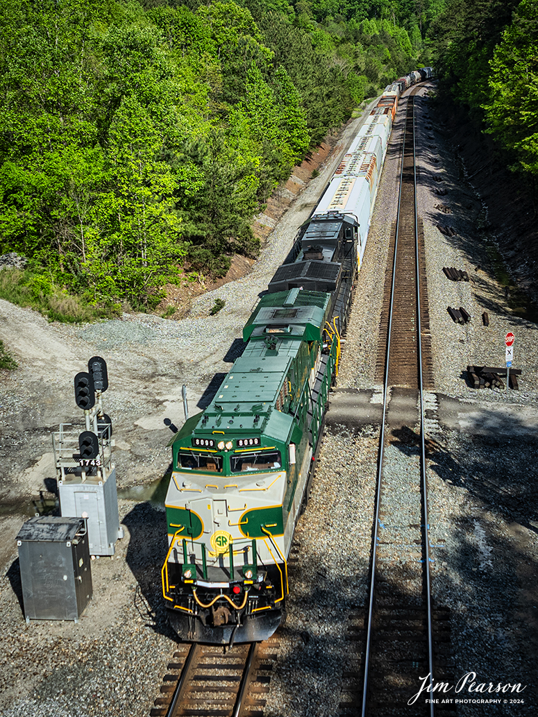 Norfolk Southern 168 is led by the Southern Heritage Unit, 8099, as it heads north at Keno cut on the NS CNO&TP (Rathole) Second District at Tateville, Kentucky, on April 29th, 2024.

This scheme is from the Southern Railway (GE) which originated as the South Carolina Canal and Railroad Company in 1827. On Christmas Day, 1830, it put into service the nation’s first regularly scheduled steam passenger train, “The Best Friend of Charleston.” Southern was incorporated in 1894 from the reorganization and consolidation of numerous predecessors and absorbed another 68 railroad companies over the next six years.

Tech Info: DJI Mavic 3 Classic Drone, RAW, 24mm, f/2.8, 1/1000, ISO 100.

#trainphotography #railroadphotography #trains #railways #dronephotography #trainphotographer #railroadphotographer #jimpearsonphotography #trains #bnsf #mavic3classic #drones #trainsfromtheair #trainsfromadrone #NSHeritageUnit #NorfolkSouthern #TennesseeTrains