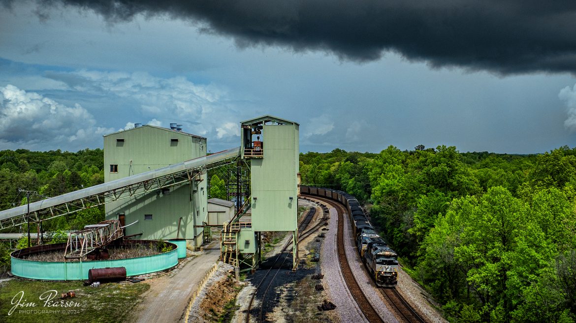 Norfolk Southern 890 passes the old mine loadout at Revelo outside Sterns, Kentucky as they head southbound with a load of coal on the NS CNO&TP (Rathole) Subdivision, on April 29th, 2024. The coal was picked up at Warrior Coal mine on the Paducah and Louisville Railway, outside of Nebo, Kentucky and is headed for the TVA power plant at Kingston, Ky under stormy skies.

Tech Info: DJI Mavic 3 Classic Drone, RAW, 22mm, f/2.8, 1/1600, ISO 100.

#railroad #railroads #train #trains #bestphoto #railroadengines #picturesoftrains #picturesofrailway #bestphotograph #photographyoftrains #trainphotography #JimPearsonPhotography #nscnotpsubdivision #norfolksouthern #trendingphoto