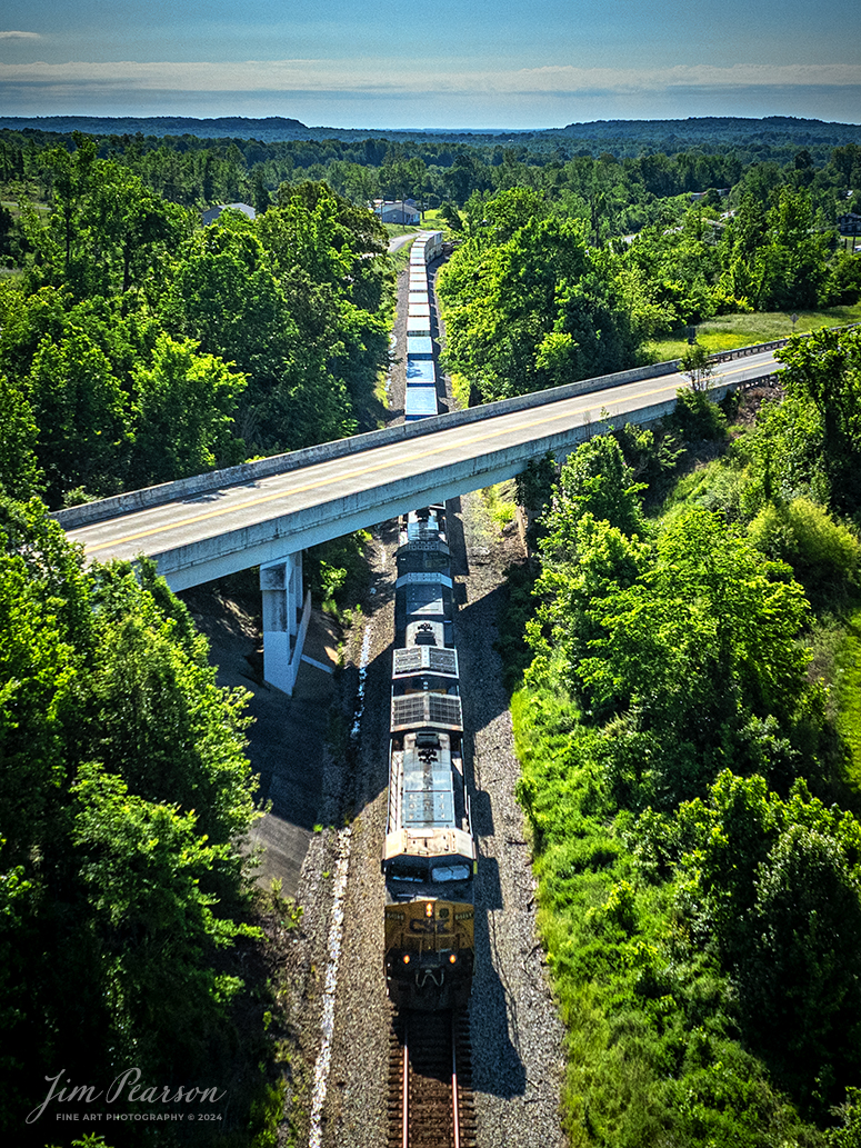 CSX intermodal I128 passes under US 41 at Barnsley, Kentucky as it heads north on the Henderson Subdivision on National Train Day, May 11th, 2024.

According to the National Today website: National Train Day is observed every year on the Saturday closest to May 10, and this year it falls on May 11. The holiday was first celebrated in the year 2008 and continues to be celebrated to this day. 

The celebrations were conceptualized by Amtrak as a way to spread awareness about the history of railway networks in the U.S. and why more people should use this mode of transport. 

Railways are one of the most eco-friendly ways to go from one place to another. Amtrak offers railroad service in countless cities in the U.S. and three cities in Canada. Railways don’t just transport people from one place to another but are also involved in the transportation of goods and certain services.

Tech Info: DJI Mavic 3 Classic Drone, RAW, 24mm, f/2.8, 1/4000, ISO 260.

#railroad #railroads #train #trains #bestphoto #railroadengines #picturesoftrains #picturesofrailway #bestphotograph #photographyoftrains #trainphotography #JimPearsonPhotography #trendingphoto