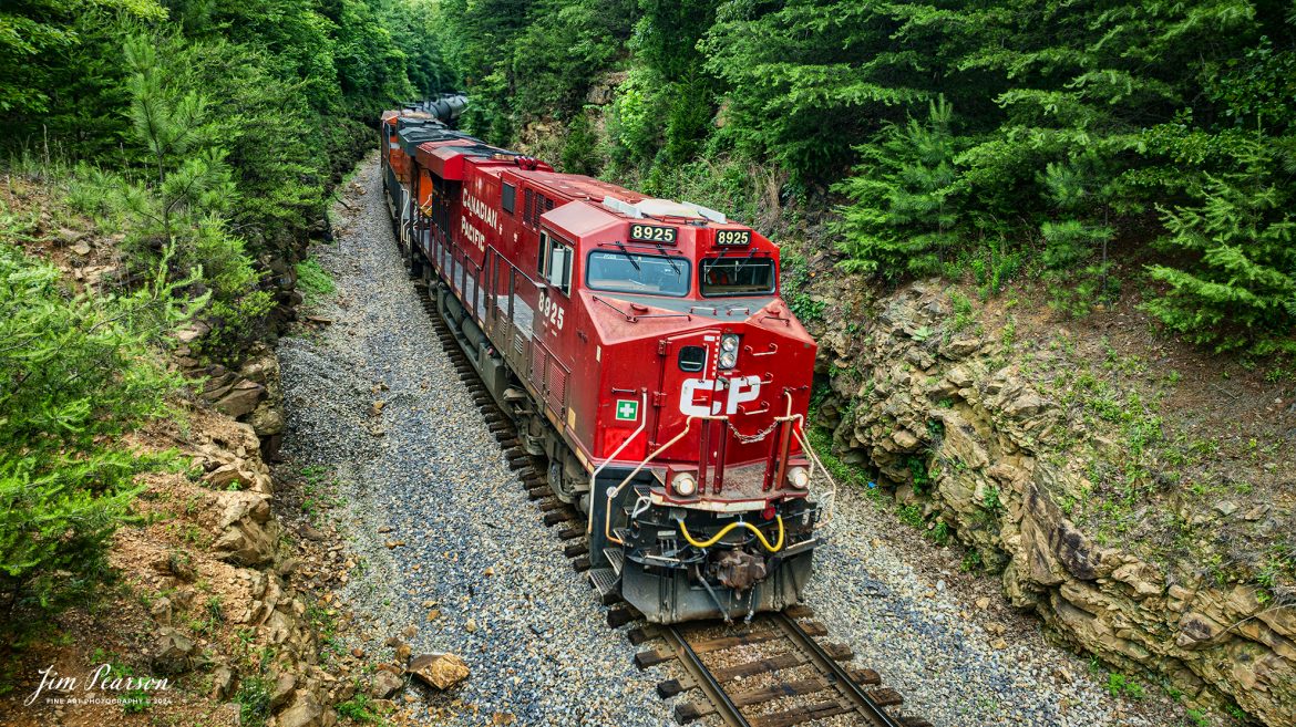 Canadian Pacific 8925 leads CSX B647, a loaded ethanol train, southbound through Crofton Cut, just north of Crofton, Kentucky on May 25th, 2025, on the CSX Henderson Subdivision.

Tech Info: DJI Mavic 3 Classic Drone, RAW, 22mm, f/8, 1/240, ISO 100.

#trainphotography #railroadphotography #trains #railways #jimpearsonphotography #trainphotographer #railroadphotographer #dronephoto #trainsfromadrone #CSX