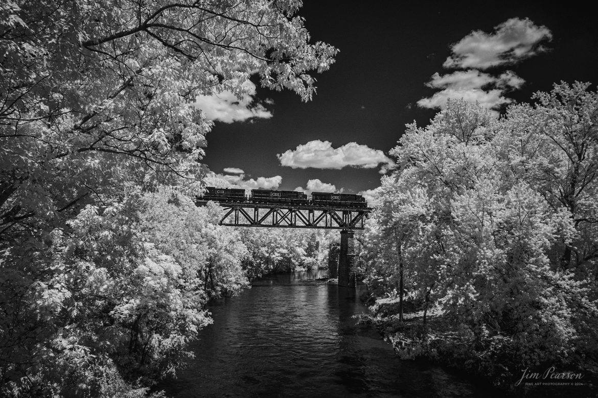 In this week’s Saturday Infrared photo, we catch CSXT 3170 leading CSX I025 south as they cross over the Red River, just north of Adams, Tennessee on May 30th, 2024, on the CSX Henderson Subdivision.

Tech Info: Fuji XT-1, RAW, Converted to 720nm B&W IR, Nikon 10-24mm @ 17mm, f/5.6, 1/950., ISO 400.

#trainphotography #railroadphotography #trains #railways #jimpearsonphotography #infraredtrainphotography #infraredphotography #trainphotographer #railroadphotographer #infaredtrainphotography #csxt #intermodal #trending