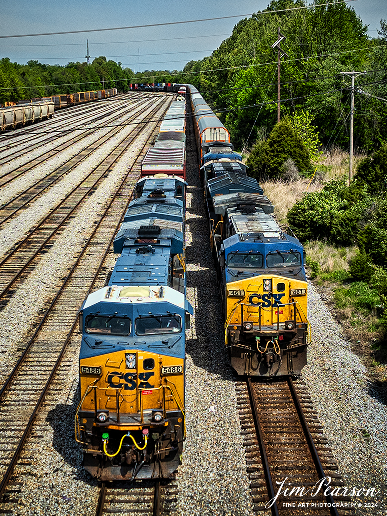 CSX hot intermodal I025, right, passes M513 at the south end of Atkinson Yard in Madisonville, Kentucky on May 7th, 2024, as they head south on the CSX Henderson Subdivision.

Tech Info: DJI Mavic 3 Classic Drone, RAW, 22mm, f/2.8, 1/2500, ISO 100.

#trainphotography #railroadphotography #trains #railways #trainphotographer #railroadphotographer #jimpearsonphotography #CSXT #KentuckyTrains