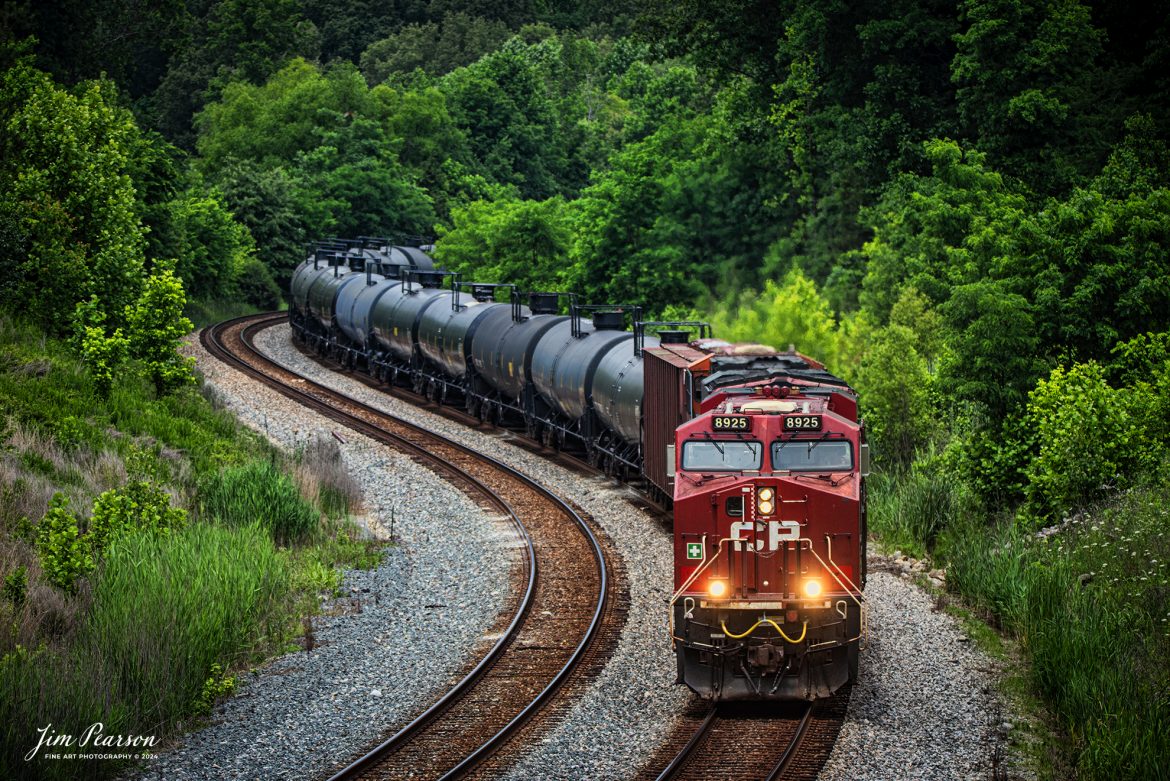 Canadian Pacific 8925 leads CSX B647, a loaded ethanol train, southbound through the S curve at Nortonville, Kentucky on May 25th, 2024, on the CSX Henderson Subdivision.

Tech Info: Nikon D800, Sigma 150-600 @ 150mm, f/6, 1/500, ISO 110.

#trainphotography #railroadphotography #trains #railways #jimpearsonphotography #trainphotographer #railroadphotographer #CSX