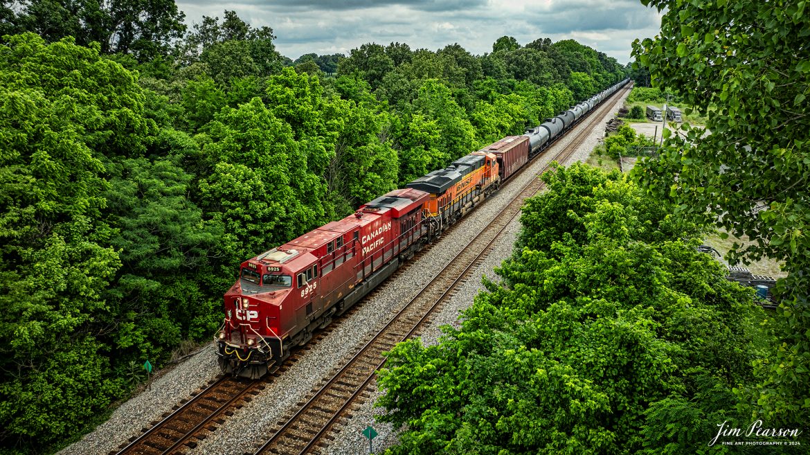 Canadian Pacific 8925 leads CSX B647, a loaded ethanol train, head southbound at Sebree, Kentucky on May 25th, 2025, on the CSX Henderson Subdivision.

Tech Info: DJI Mavic 3 Classic Drone, RAW, 22mm, f/8, 1/1000, ISO 180.

#trainphotography #railroadphotography #trains #railways #jimpearsonphotography #trainphotographer #railroadphotographer #dronephoto #trainsfromadrone #CSX