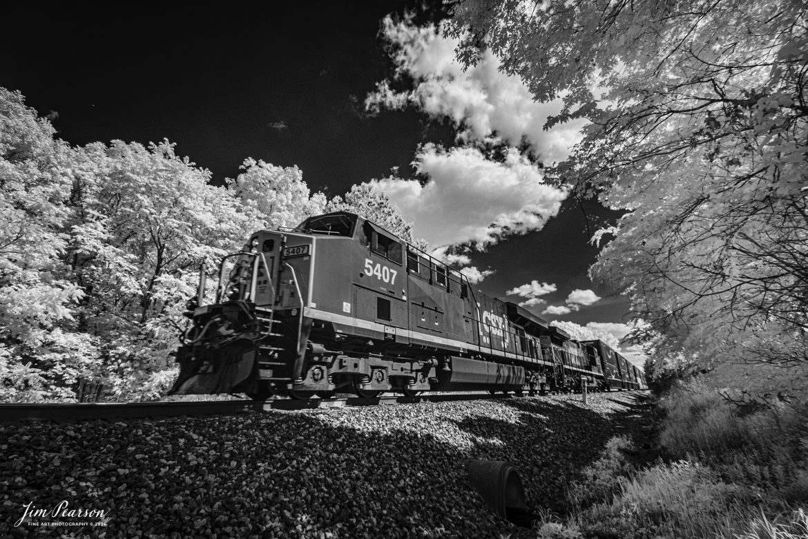 In this week’s Saturday Infrared photo, we catch CSXT 5407 leading CSX I128 north after coming off the Gum Lick Trestle, north of Kelly, Kentucky, on May 30th, 2024, on the CSX Henderson Subdivision.

Tech Info: Fuji XT-1, RAW, Converted to 720nm B&W IR, Nikon 10-24mm @ 10, f/5.6, 1/450., ISO 400.

#trainphotography #railroadphotography #trains #railways #jimpearsonphotography #infraredtrainphotography #infraredphotography #trainphotographer #railroadphotographer #infaredtrainphotography #csxt #intermodal #trending