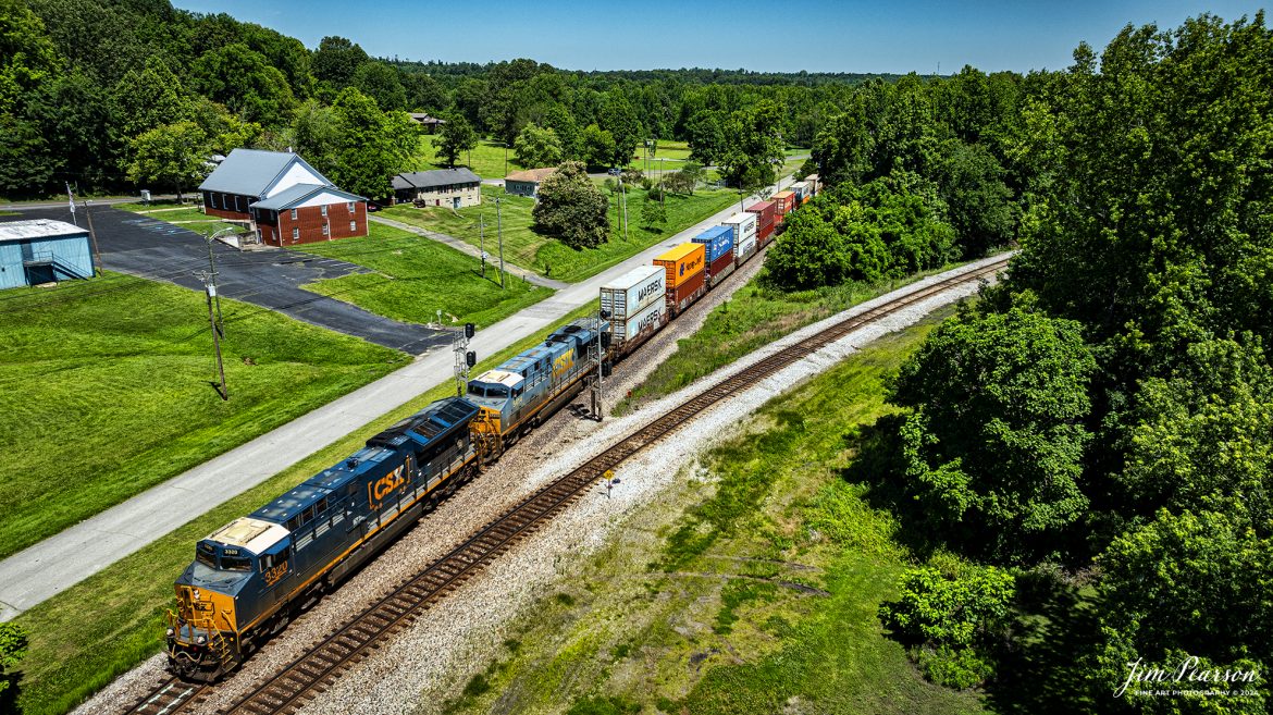 CSXT 3320 and 5414 lead on CSX I025 as it passes the Earlington-Madisonville cutoff at Mortons Junction in Mortons Gap, Kentucky, on June 13th, 2024, on the Henderson Subdivision as it makes its way south. 

Tech Info: DJI Mavic 3 Classic Drone, RAW, 22mm, f/2.8, 1/1250, ISO 100.

#railroad #railroads #train #trains #bestphoto #railroadengines #picturesoftrains #picturesofrailway #bestphotograph #photographyoftrains #trainphotography #JimPearsonPhotography #trendingphoto #csxt #trainsfromadrone