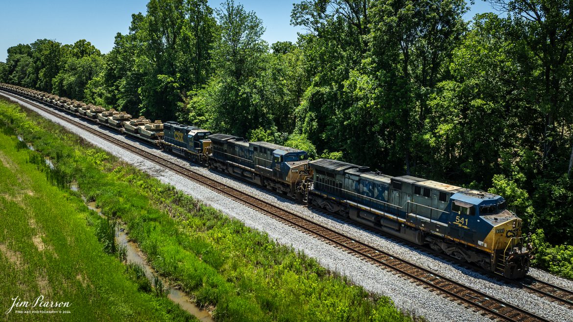 CSX M512 heads north past the siding at Slaughters, Kentucky, on June 13th, 2024, with a string of 30 M1 Tanks in their consist as they head north on the CSX Henderson Subdivision. 

Tech Info: DJI Mavic 3 Classic Drone, RAW, 22mm, f/2.8, 1/1600, ISO 120.

#railroad #railroads #train #trains #bestphoto #railroadengines #picturesoftrains #picturesofrailway #bestphotograph #photographyoftrains #trainphotography #JimPearsonPhotography #trendingphoto #csxt #trainsfromadrone #military