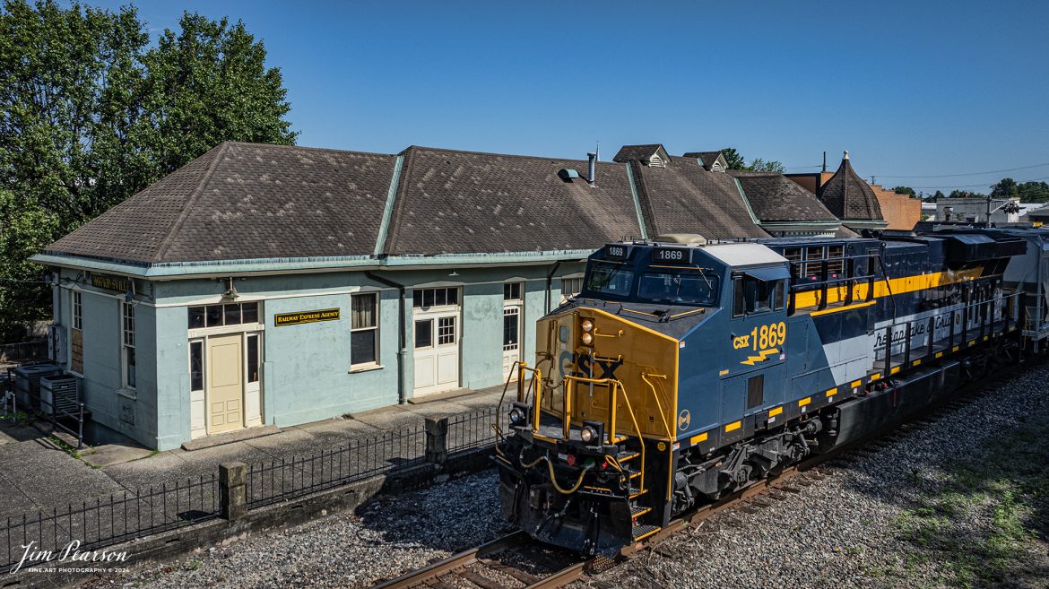 CSX Chesapeake and Ohio Heritage unit 1868 leads M503 as it passes the old L&N Depot at Hopkinsville, Kentucky on the Henderson Subdivision, on the first day of summer, June 20th, 2024.

From a CSX Press Release: A locomotive commemorating the proud history of the Chesapeake and Ohio Railway has entered service as the fifth in the CSX heritage series celebrating the lines that came together to form the modern railroad.

Numbered CSX 1869 in honor of the year the C&O was formed in Virginia from several smaller railroads, the newest heritage locomotive sports a custom paint design that includes today’s CSX colors on the front of the engine and transitions to a paint scheme inspired by 1960s era C&O locomotives on the rear two-thirds.

The C&O Railway was a major line among North American freight and passenger railroads for nearly a century before becoming part of the Chessie System in 1972 and eventually merging into the modern CSX. In 1970, the C&O included more than 5,000 route miles of track stretching from Newport News, Virginia, to Chicago and the Great Lakes.

Tech Info: DJI Mavic 3 Classic Drone, RAW, 22mm, f/2.8, 1/2000, ISO 100.

#railroad #railroads #train #trains #bestphoto #railroadengines #picturesoftrains #picturesofrailway #bestphotograph #photographyoftrains #trainphotography #JimPearsonPhotography #trendingphoto #csxt #trainsfromadrone #csxheritage