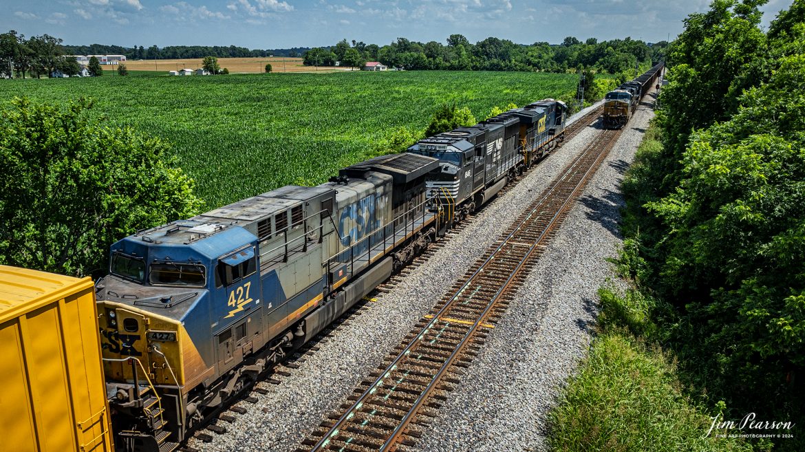 CSX M647 waits in the siding at the north end of Crofton as empty northbound coal train passes them at Crofton, Ky on June 21st, 2024, on the CSX Henderson Subdivision.

Tech Info: DJI Mavic 3 Classic Drone, RAW, 22mm, f/2.8, 1/2000, ISO 110.

#railroad #railroads #train #trains #bestphoto #railroadengines #picturesoftrains #picturesofrailway #bestphotograph #photographyoftrains #trainphotography #JimPearsonPhotography #trendingphoto #csxt #trainsfromadrone #csxheritage